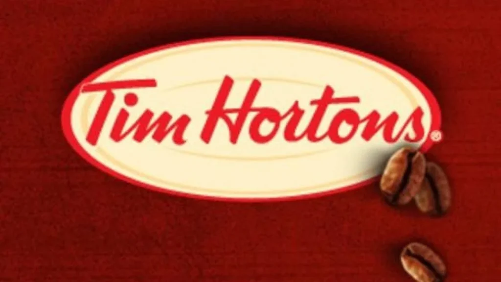 Logo Tim Hortons sur fond rouge avec grains