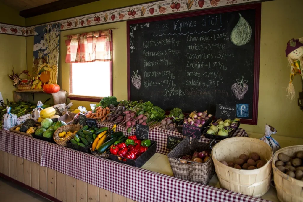 Étal de légumes frais avec ardoise des prix