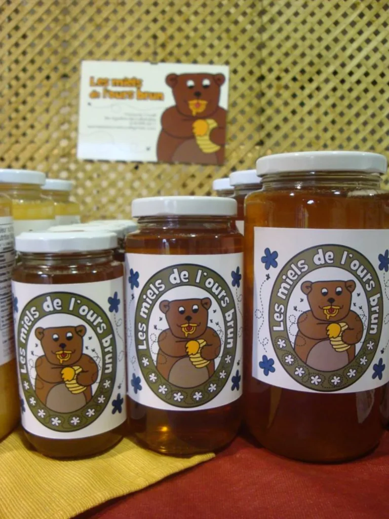 Bocaux de miel artisanal avec ours illustré